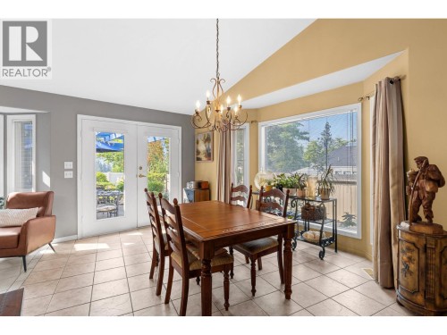 Dining room with doors to private yard. - 4000 Gallaghers Terrace, Kelowna, BC - Indoor Photo Showing Dining Room