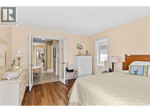 Spacious primary bedroom. - 4000 Gallaghers Terrace, Kelowna, BC - Indoor Photo Showing Bedroom