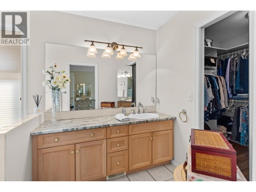 Large bathroom with walk in closet. - 4000 Gallaghers Terrace, Kelowna, BC - Indoor Photo Showing Bathroom