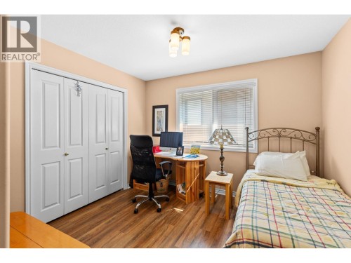 2nd bedroom main floor. - 4000 Gallaghers Terrace, Kelowna, BC - Indoor Photo Showing Bedroom