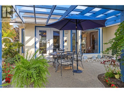 Outdoor dining area. - 4000 Gallaghers Terrace, Kelowna, BC - Outdoor With Deck Patio Veranda