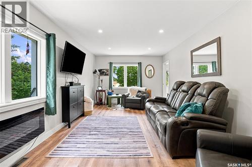 507 Railway Avenue, Bulyea, SK - Indoor Photo Showing Living Room With Fireplace