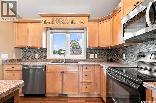 506 Antler Crescent, Warman, SK - Indoor Photo Showing Kitchen With Double Sink