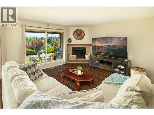 Living Room - 2226 Golf Course Drive, West Kelowna, BC - Indoor Photo Showing Living Room With Fireplace