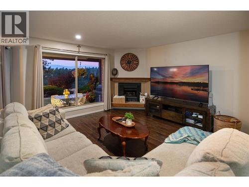 Living Room - 2226 Golf Course Drive, West Kelowna, BC - Indoor Photo Showing Living Room With Fireplace