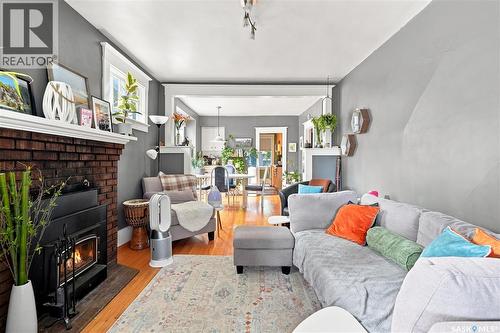 179 Angus Crescent, Regina, SK - Indoor Photo Showing Living Room With Fireplace