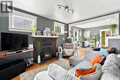 179 Angus Crescent, Regina, SK - Indoor Photo Showing Living Room With Fireplace