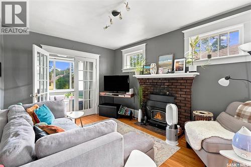 179 Angus Crescent, Regina, SK - Indoor Photo Showing Living Room With Fireplace