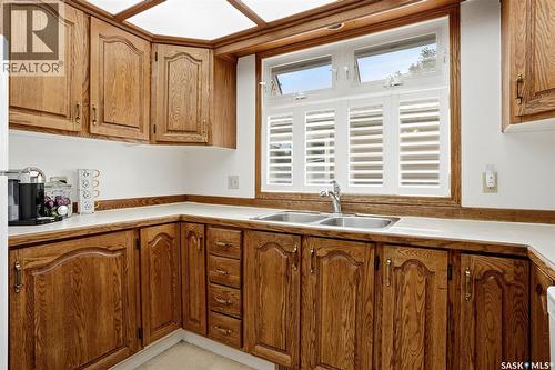 60 Krivel Crescent, Regina, SK - Indoor Photo Showing Kitchen With Double Sink