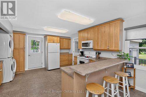 Kitchen with Breakfast Bar - 150 Lafontaine Road E, Tiny, ON - Indoor Photo Showing Kitchen