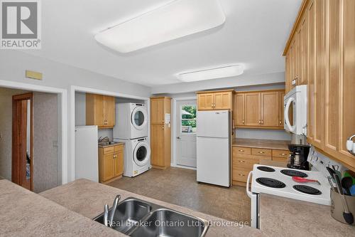Kitchen with Laundry - 150 Lafontaine Road E, Tiny, ON - Indoor Photo Showing Kitchen With Double Sink