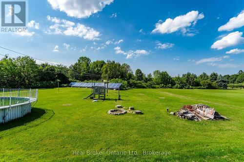Rear Yard and Solar Panels - 150 Lafontaine Road E, Tiny, ON - Outdoor With View
