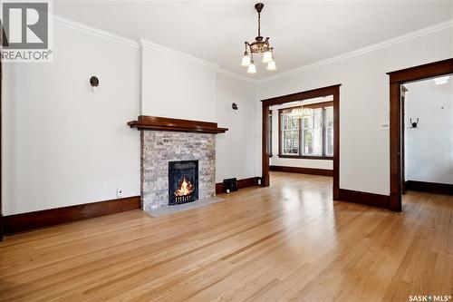 1706 15Th Avenue, Regina, SK - Indoor Photo Showing Other Room With Fireplace