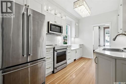 1706 15Th Avenue, Regina, SK - Indoor Photo Showing Kitchen With Stainless Steel Kitchen With Double Sink With Upgraded Kitchen