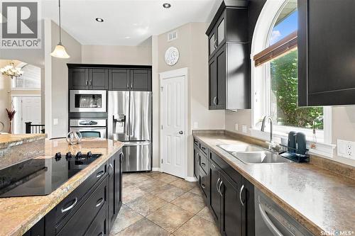715 Bellmont Court, Saskatoon, SK - Indoor Photo Showing Kitchen With Double Sink With Upgraded Kitchen