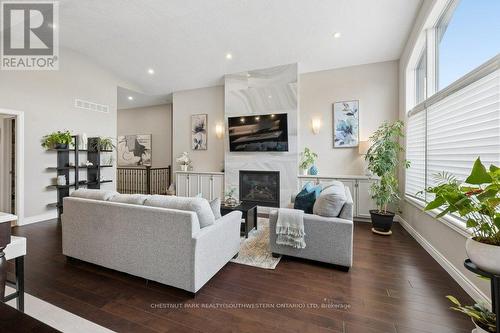 30 Duncan Court, Centre Wellington, ON - Indoor Photo Showing Living Room With Fireplace