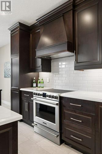 30 Duncan Court, Centre Wellington, ON - Indoor Photo Showing Kitchen With Stainless Steel Kitchen With Upgraded Kitchen