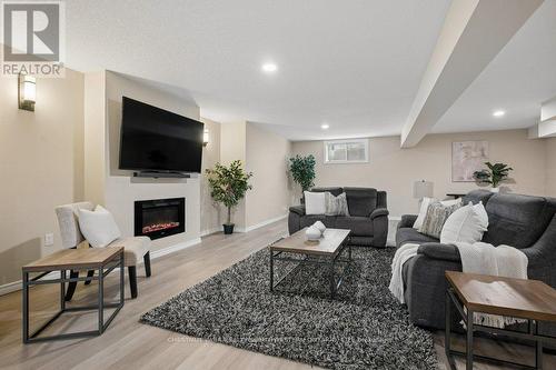 30 Duncan Court, Centre Wellington, ON - Indoor Photo Showing Living Room With Fireplace