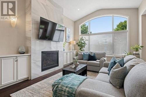 30 Duncan Court, Centre Wellington, ON - Indoor Photo Showing Living Room With Fireplace