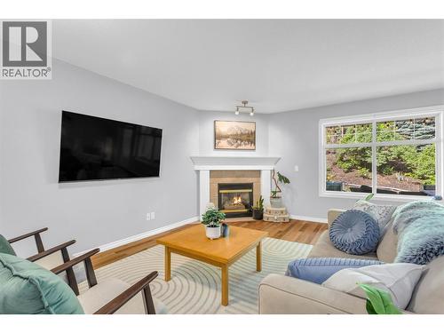 Main living area - 3825 Glen Canyon Drive Unit# 104, West Kelowna, BC - Indoor Photo Showing Living Room With Fireplace