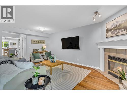 Main living area - 3825 Glen Canyon Drive Unit# 104, West Kelowna, BC - Indoor Photo Showing Living Room With Fireplace