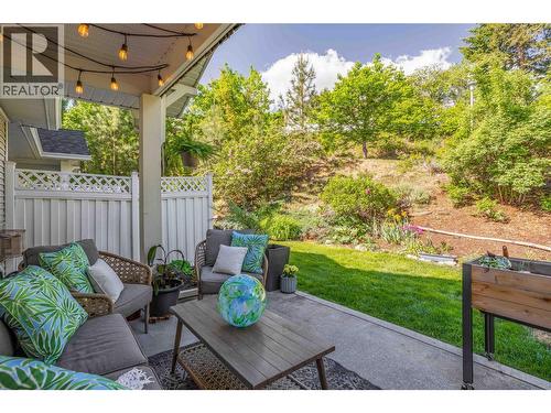 Huge back patio area looking onto green space. - 3825 Glen Canyon Drive Unit# 104, West Kelowna, BC - Outdoor With Deck Patio Veranda