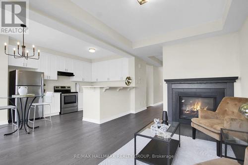 207 Willow Aster Circle, Ottawa, ON - Indoor Photo Showing Living Room With Fireplace