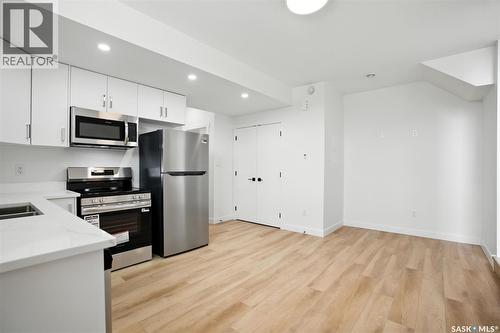 138 Sharma Lane, Saskatoon, SK - Indoor Photo Showing Kitchen With Double Sink