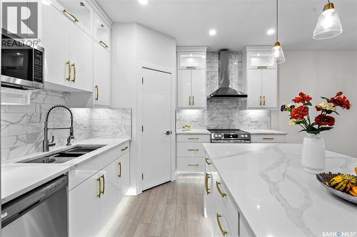 138 Sharma Lane, Saskatoon, SK - Indoor Photo Showing Kitchen With Double Sink With Upgraded Kitchen