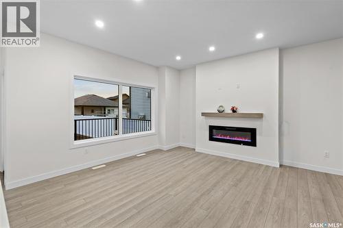 138 Sharma Lane, Saskatoon, SK - Indoor With Fireplace