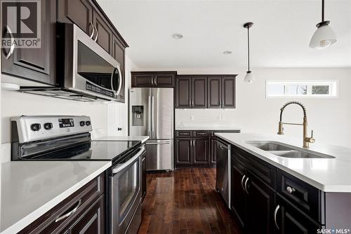 5257 Canuck Crescent, Regina, SK - Indoor Photo Showing Kitchen With Stainless Steel Kitchen With Double Sink With Upgraded Kitchen