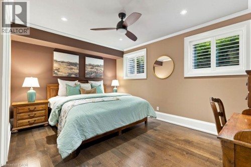 Wood-finish flooring, recessed lighting, and a ceiling fan with light - 253 Rossmore Boulevard, Burlington, ON - Indoor Photo Showing Bedroom