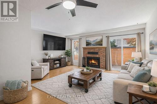 1432 Deavy Way, Ottawa, ON - Indoor Photo Showing Living Room With Fireplace