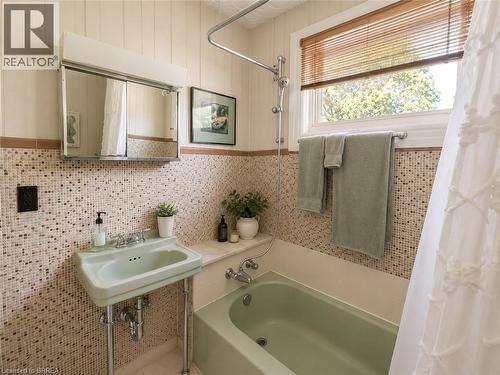 A full bathroom conveniently located in the bedroom area adds comfort and functionality. - 49 Palmerston Avenue, Brantford, ON - Indoor Photo Showing Bathroom