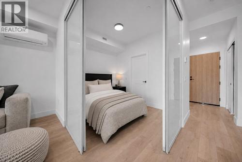Photos have been virtually staged for illustrative and marketing purposes. Unaltered photos are also included for reference. - 620 Coronation Avenue Unit# 409, Kelowna, BC - Indoor Photo Showing Bedroom