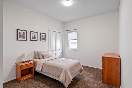 138 Ed Golding Bay, Winnipeg, MB - Indoor Photo Showing Bedroom