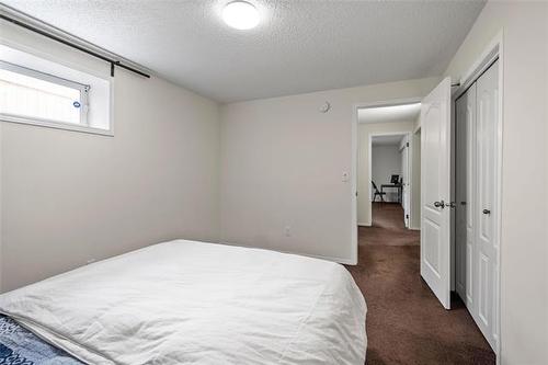 138 Ed Golding Bay, Winnipeg, MB - Indoor Photo Showing Bedroom