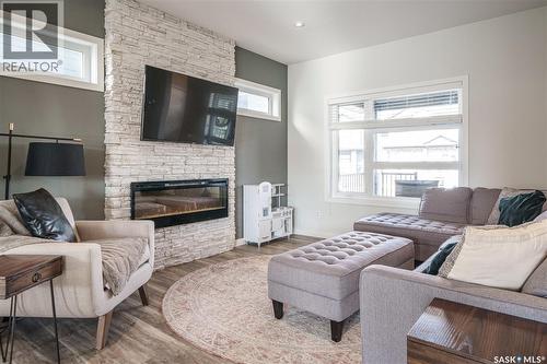 359 Marlatte Street, Saskatoon, SK - Indoor Photo Showing Living Room With Fireplace