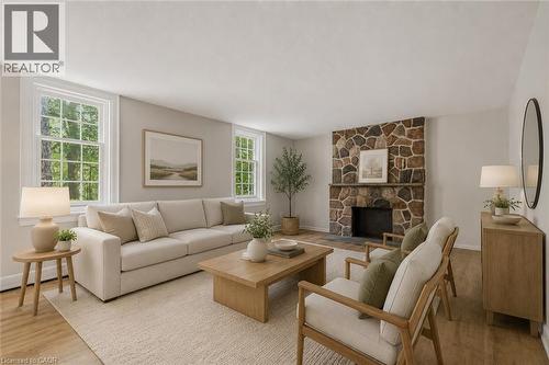 VIRTUALLY STAGED IMAGE - 41 Mill Street, Mississauga, ON - Indoor Photo Showing Living Room With Fireplace