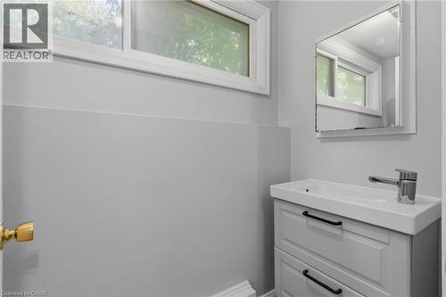 Vanity with integrated sink, chrome faucet, and black hardware - 41 Mill Street, Mississauga, ON - Indoor
