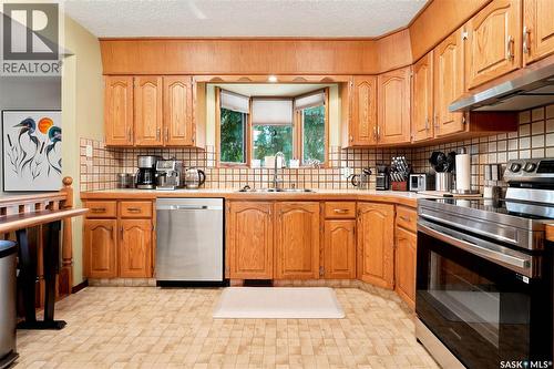 2734 Poplar Place E, Regina, SK - Indoor Photo Showing Kitchen With Double Sink
