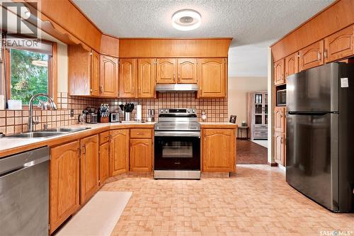 2734 Poplar Place E, Regina, SK - Indoor Photo Showing Kitchen With Double Sink