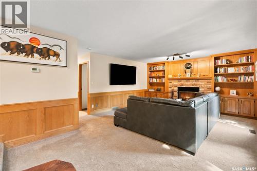 2734 Poplar Place E, Regina, SK - Indoor With Fireplace