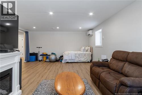 50 Walker Crescent, Hampton, NB - Indoor Photo Showing Other Room With Fireplace