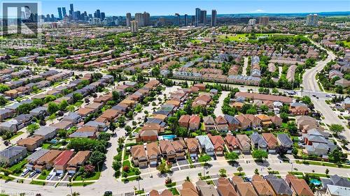 Expansive suburban landscape featuring numerous residential properties with diverse rooflines and mature green foliage - 5184 Red Brush Drive, Mississauga, ON - Outdoor With View