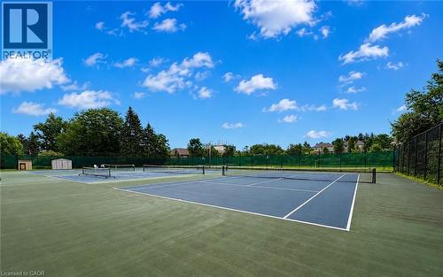 Multiple hard-surface tennis courts with perimeter fencing - 119 Sandy Ridge Place, Waterloo, ON - Outdoor With View