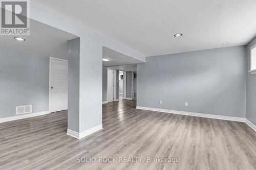 Luxury vinyl flooring and pot lights - 1227 Portland Avenue, Ottawa, ON - Indoor Photo Showing Other Room