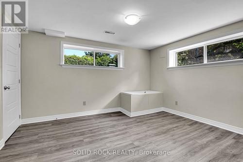 Basement bdrm w/ large windows and walk-in closet - 1227 Portland Avenue, Ottawa, ON - Indoor Photo Showing Other Room