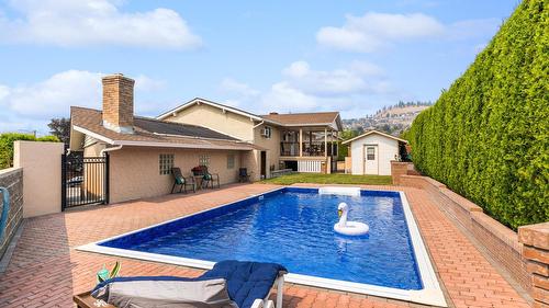 1643 Traut Court, Kelowna, BC - Outdoor With In Ground Pool