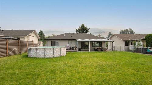 1726 Hayashi Road, Kelowna, BC - Outdoor With Above Ground Pool